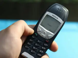 basic nokia phone being held